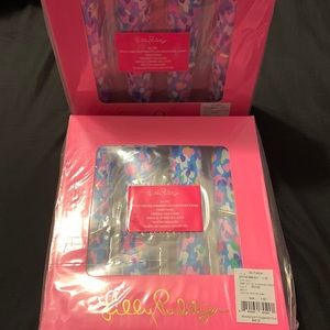 New in Package two sets of 4 Lilly Pulitzer napkins with rings